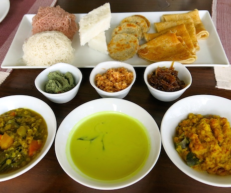 A wonderful array of string hoppers, milkrice, cocnut roti and dosai with sambals, kiri hodi, curry and dahl.