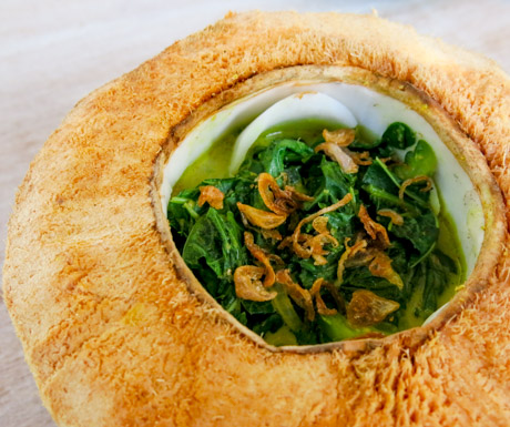 vegan soup served in a coconut