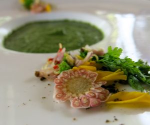 Green soup with edible flowers at Puri Ganesha