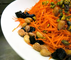 vegan salad with carrots and mixed nuts