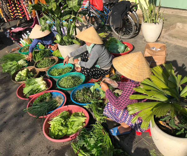 Market Sellers in Hoi An
